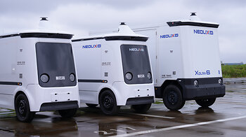 Neolix autonomous delivery vehicles are parked at Tokyo Ryutsu Center.